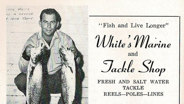 Vintage advertisement for White's Marine and Tackle Shop featuring a man with two fish.