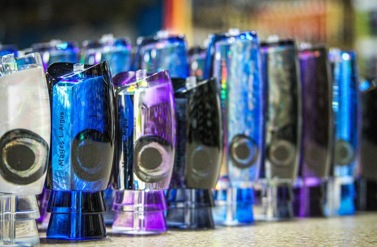 Collection of colorful trolling lure heads with a blurred background