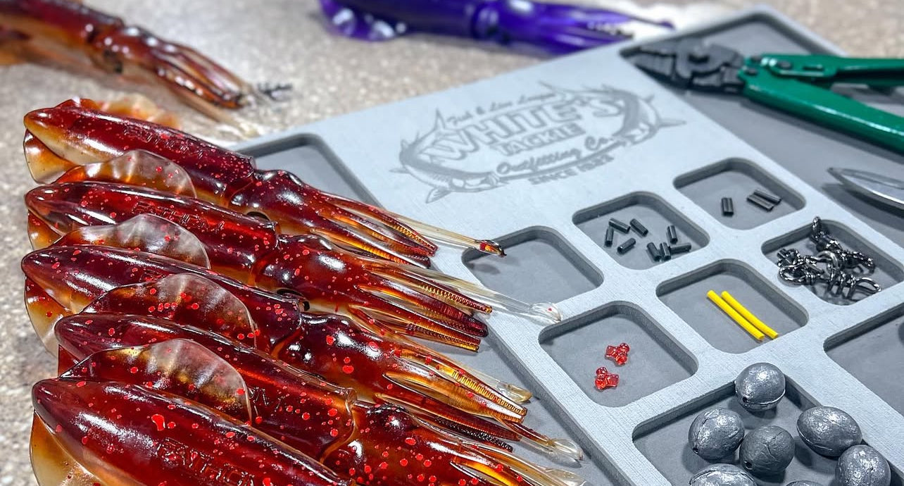 Set of plastic squids and rigging supplies and tools on a gray tray with visible branding.